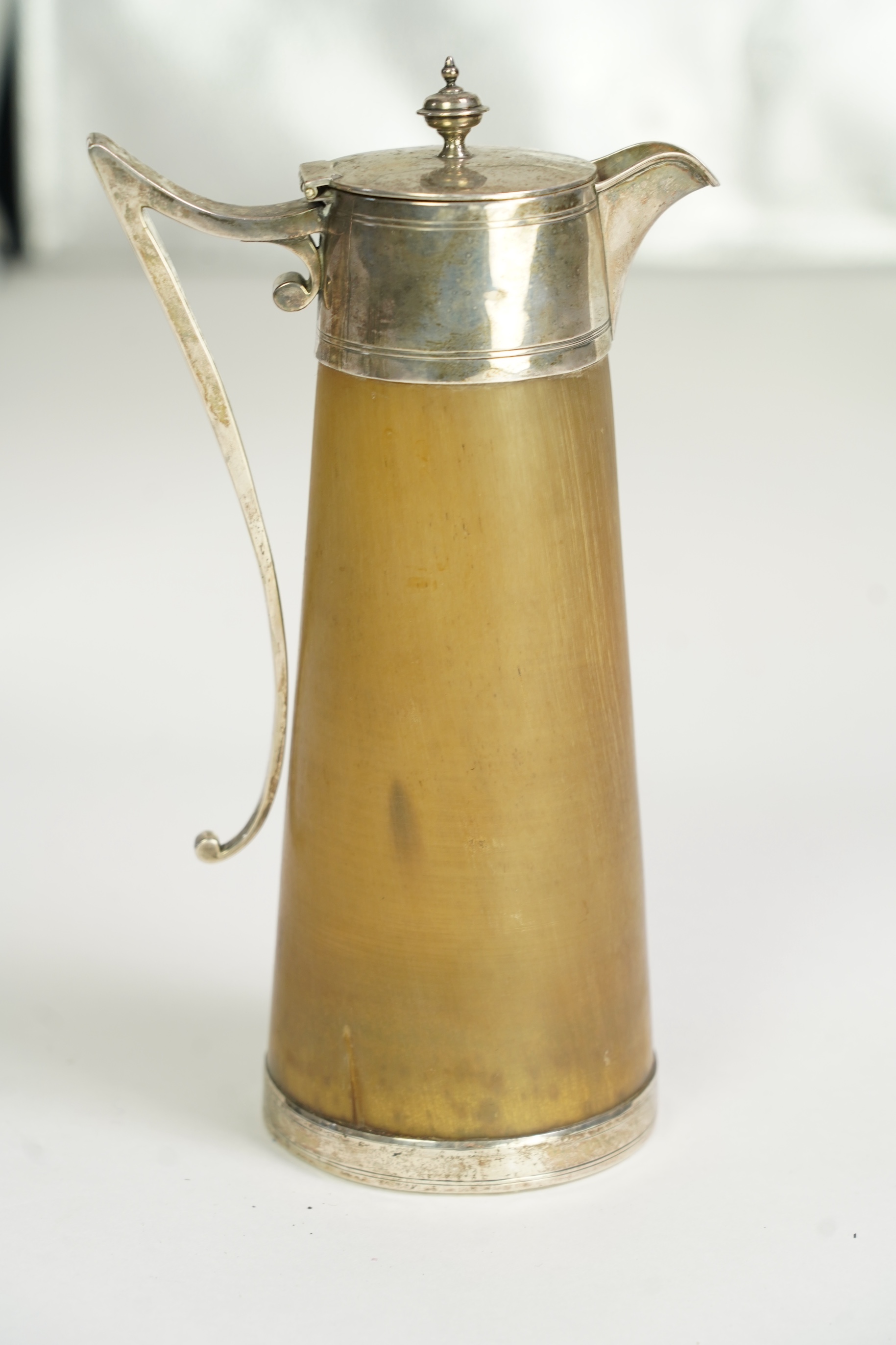 A late Victorian silver mounted horn claret jug and hinged cover, by John Clemmens